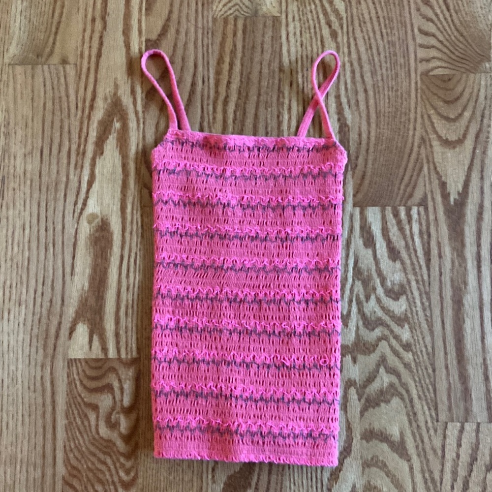 Pink top with green accents